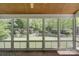Bright and airy screened porch with scenic backyard view at 10029 Daufuskie Dr, Charlotte, NC 28278