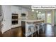 Modern kitchen with white cabinets, granite countertops, and stainless steel appliances at 1005 Merganser Way, Indian Trail, NC 28079