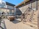 Spacious back porch featuring stairs and an outdoor pool table at 1655 Scotland Ave, Charlotte, NC 28207