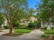 Beautiful home with well-manicured lawn, mature landscaping, and circular driveway at 1655 Scotland Ave, Charlotte, NC 28207