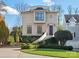 Charming home featuring unique architecture, manicured landscaping, and inviting curb appeal at 1655 Scotland Ave, Charlotte, NC 28207