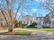 Charming home with well-manicured landscaping and a circular driveway at 1655 Scotland Ave, Charlotte, NC 28207