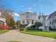 Attractive home with mature trees, manicured landscaping, and a circular driveway at 1655 Scotland Ave, Charlotte, NC 28207