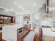 Modern kitchen boasts a large center island, stainless steel appliances, and opens to the dining area at 1655 Scotland Ave, Charlotte, NC 28207
