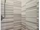 Shower stall features marble patterned wall with a chrome rain shower at 1655 Scotland Ave, Charlotte, NC 28207