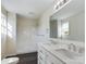 Bathroom boasts double vanity, a shower, and dark gray floors at 2061 Gary Ln, Hickory, NC 28602
