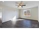 Spacious bedroom featuring hardwood floors and a ceiling fan at 2061 Gary Ln, Hickory, NC 28602