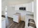 White kitchen cabinets, granite countertops and stainless steel appliances at 2061 Gary Ln, Hickory, NC 28602