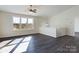 Bright living room with hardwood floors and large windows at 2061 Gary Ln, Hickory, NC 28602