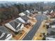 This aerial view shows a quiet neighborhood with mature trees and well-maintained yards at 2481 Bergamot St, Tega Cay, SC 29708