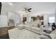 Open-concept living room flows to the modern kitchen, ideal for entertaining and Gathering gatherings at 2481 Bergamot St, Tega Cay, SC 29708