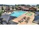 Community pool with waterslide, lap lanes, and chairs for lounging at 2481 Bergamot St, Tega Cay, SC 29708