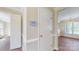 Welcoming entryway with hardwood floors, classic trim, and adjacent rooms at 2605 Willowdale Ln, Matthews, NC 28105