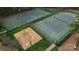 Aerial view of tennis courts and playground showcasing recreational amenities at 2605 Willowdale Ln, Matthews, NC 28105