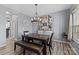 Formal dining room with chandelier and built-in shelving at 3032 Sterling Ct, Indian Land, SC 29707