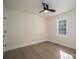 Spacious bedroom with hardwood floors and large window at 1402 Springdale Park Dr, Lincolnton, NC 28092