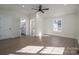 Bright bedroom with hardwood floors and ceiling fan at 1402 Springdale Park Dr, Lincolnton, NC 28092