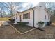 Front view of a newly renovated white brick house at 1402 Springdale Park Dr, Lincolnton, NC 28092