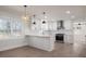 Modern kitchen with white shaker cabinets, quartz countertops, and stainless steel appliances at 1402 Springdale Park Dr, Lincolnton, NC 28092