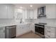 Modern kitchen with white shaker cabinets, quartz countertops, and stainless steel appliances at 1402 Springdale Park Dr, Lincolnton, NC 28092