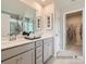 Large bathroom with double vanity, walk-in shower, and closet at 1812 Otter Perch Ln, Fort Mill, SC 29715