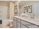 Elegant bathroom with double vanity and a shower/tub combo at 1812 Otter Perch Ln, Fort Mill, SC 29715