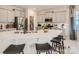 Modern kitchen with large island and seating at 1812 Otter Perch Ln, Fort Mill, SC 29715