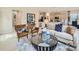 Spacious living room with leather armchairs and sofa at 1812 Otter Perch Ln, Fort Mill, SC 29715