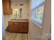 Bathroom with granite countertop and wood vanity at 433 Pamela St, Gastonia, NC 28054