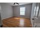 Bright bedroom with hardwood floors and window at 433 Pamela St, Gastonia, NC 28054