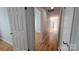 Hardwood floor hallway connecting bedrooms at 433 Pamela St, Gastonia, NC 28054