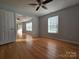 Hardwood floors, ceiling fan, and access to other rooms at 433 Pamela St, Gastonia, NC 28054