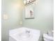 Small bathroom with sink and mirror at 5315 Ruth Dr, Charlotte, NC 28215
