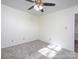 Bright bedroom with ceiling fan and neutral decor at 5315 Ruth Dr, Charlotte, NC 28215
