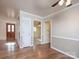 Hardwood floors and view into living and dining areas at 5315 Ruth Dr, Charlotte, NC 28215