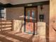 Brick ranch home with a wooden deck and stairs at 5315 Ruth Dr, Charlotte, NC 28215