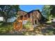 Charming brick home with a welcoming covered porch and a well-maintained front yard at 5315 Ruth Dr, Charlotte, NC 28215