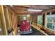 Renovated garage with visible wooden framework and vintage car under repair at 5315 Ruth Dr, Charlotte, NC 28215