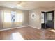 Living room with hardwood floors, neutral walls, and windows at 5315 Ruth Dr, Charlotte, NC 28215