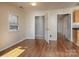 Bright living room with hardwood floors and access to other rooms at 5315 Ruth Dr, Charlotte, NC 28215