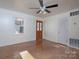 Living room with hardwood floors and front door at 5315 Ruth Dr, Charlotte, NC 28215