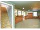 Finished basement with brick fireplace and bar area at 5839 Painted Fern Ct, Charlotte, NC 28269