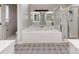Primary bathroom with soaking tub, double vanity, and a walk-in shower at 5839 Painted Fern Ct, Charlotte, NC 28269