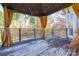Wooden deck with gazebo and curtains, offering a relaxing outdoor space at 5839 Painted Fern Ct, Charlotte, NC 28269