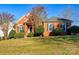 Brick house with landscaping, a walkway, and a double-door entry at 5839 Painted Fern Ct, Charlotte, NC 28269