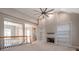 Gathering room features built-in shelving, fireplace, and hardwood floors at 5839 Painted Fern Ct, Charlotte, NC 28269