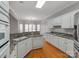 Spacious kitchen with granite countertops and white cabinets at 5839 Painted Fern Ct, Charlotte, NC 28269