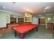 Game room boasts a pool table and stained glass light at 5839 Painted Fern Ct, Charlotte, NC 28269