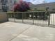Outdoor area with a metal fence, garden and beautiful scenery, providing a relaxing outdoor retreat at 721 Governor Morrison St # 425, Charlotte, NC 28211