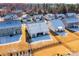 Scenic aerial view of neighborhood homes with snow-dusted roofs and fenced backyards at 7669 Tanglewood Way, Denver, NC 28037